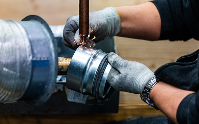 Precision metal processing and quality control at Flexit factory